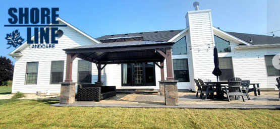 Backyard landscape design with patio and outdoor seating area