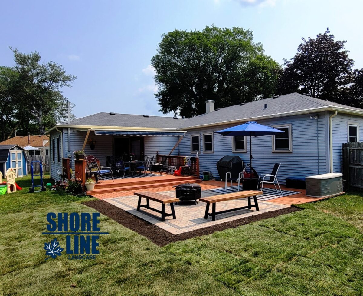 Residential backyard patio with paver walkway